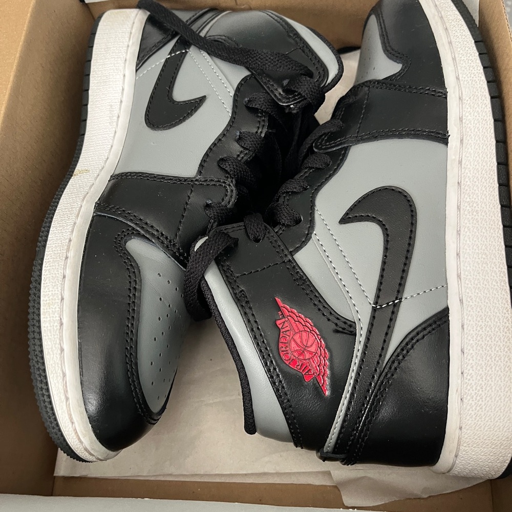 Jordan Black and Gray Sneakers with Red Accent
